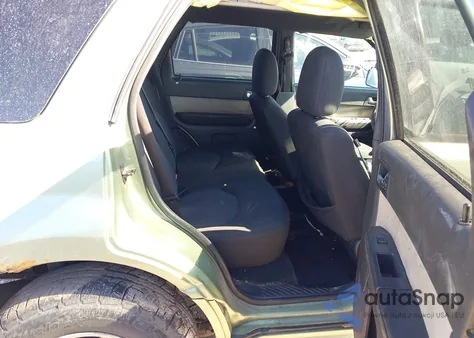 2009 Mercury Mariner I4 z USA, uszkodzony, nr VIN 4M2CU81799KJ17356